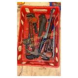 Box of pipe wrenches and other tools