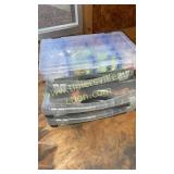 Four plastic tackle boxes full of panfish jigs,