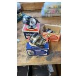 Three vintage Shakespeare reels with boxes