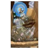 Box with decanter and old bottles