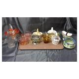 Group of 12 small glass and decorative baskets