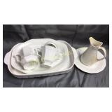 Group of white and ironstone dishes