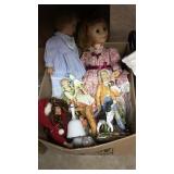 Box of figurines and dolls