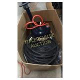 Box with high pressure hose and oil pump