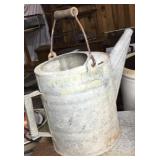 Galvanized water can