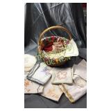 Basket of embroidery and linens