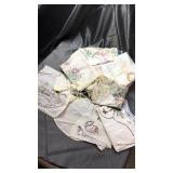 Vintage hand done embroidery and linens on footed