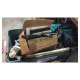 Box of decor, yearbooks, crossbow, misc