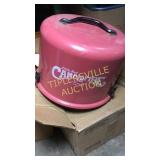 Box with little red camp fire cooker