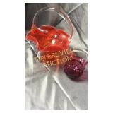 2 art glass baskets orange one has crack in