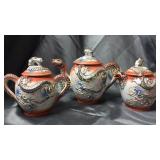 Dragon ware teapot with cream and sugar damage on