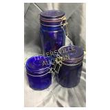 Cobalt canisters tallest full of cookie cutters