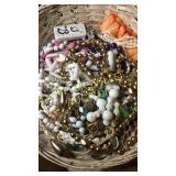 Basket of costume jewelry