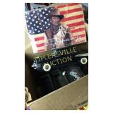 Toy cars and John Wayne sign