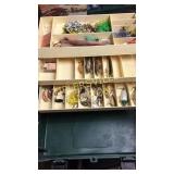 Green tackle box and lures