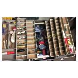 Brown tacklebox with lures and fly reel