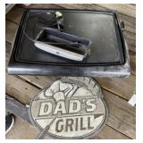 Electric Grill and Metal Sign