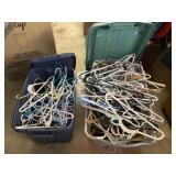 2 - Totes Full of Plastic Hangers