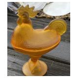 Amber Rooster on Nest