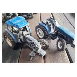 ERTL 1/16 New Holland Utility Tractors x2 8560