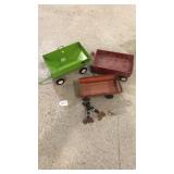 (3) Toy grain carts. One rough and.....