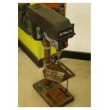 Delta Drill Press with container of Drill Bits
