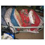Rotan basket with misc pillows
