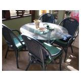 Rotan, glasstop table and chairs