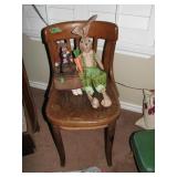Wodoen chair with misc decor
