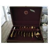 Gold Tone silverware with wood case