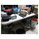 Tabletop of misc garage items
