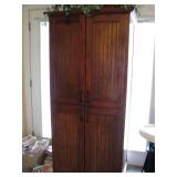Wooden cabinet with misc kitchen items