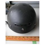 Black fiberglass motorcycle helmet with shield