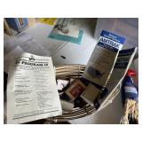 Misc paper, hotel soap lot, neta basket included