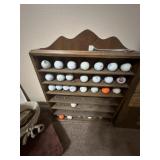 Wood display w/misc golf balls