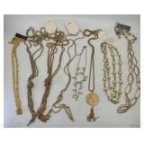Eight Gold-Tone Costume Necklaces