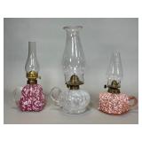 Three Spatter Glass Oil Lamps