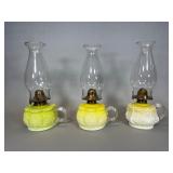 Three Yellow Glass Oil Lamps with Reeded Handles