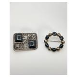 Two Sterling Silver Brooches