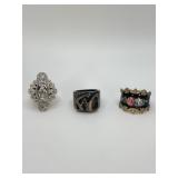 Three Sterling Rings: Religious, Monogram, Floral