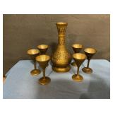 Vintage brass decanter and six miniature goblets