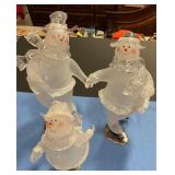 Frosted snowman trio/ice-skating