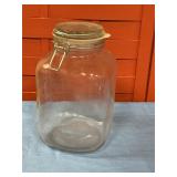 Glass canister with lid 10" tall 5" wide