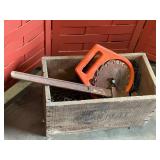 Wooden box of tools and chains