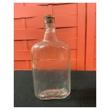Glass pint bottle with lid