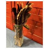 Vase with feathers