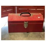 Red metal toolbox with screws andtools
