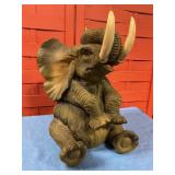 Resin elephant statue, 13" tall 8"across-