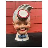 Vintage cast-iron Coca-Cola coin bank "Sprite Boy"
