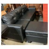 Small dorm size sofa with footstool leather look